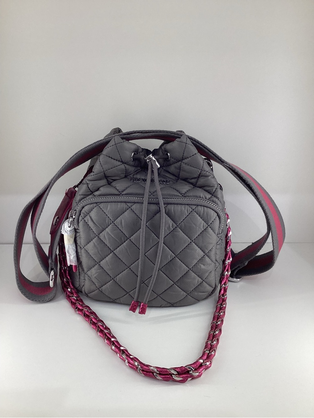 NWT MZ Wallace Quilted Gray Mini Drawstring Crossbody with Pink Accent & Chain.